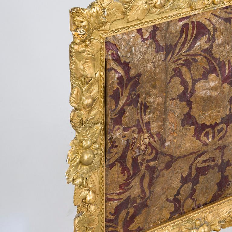 A Baroque style/Rococo revival brass protection, late 19th century.
