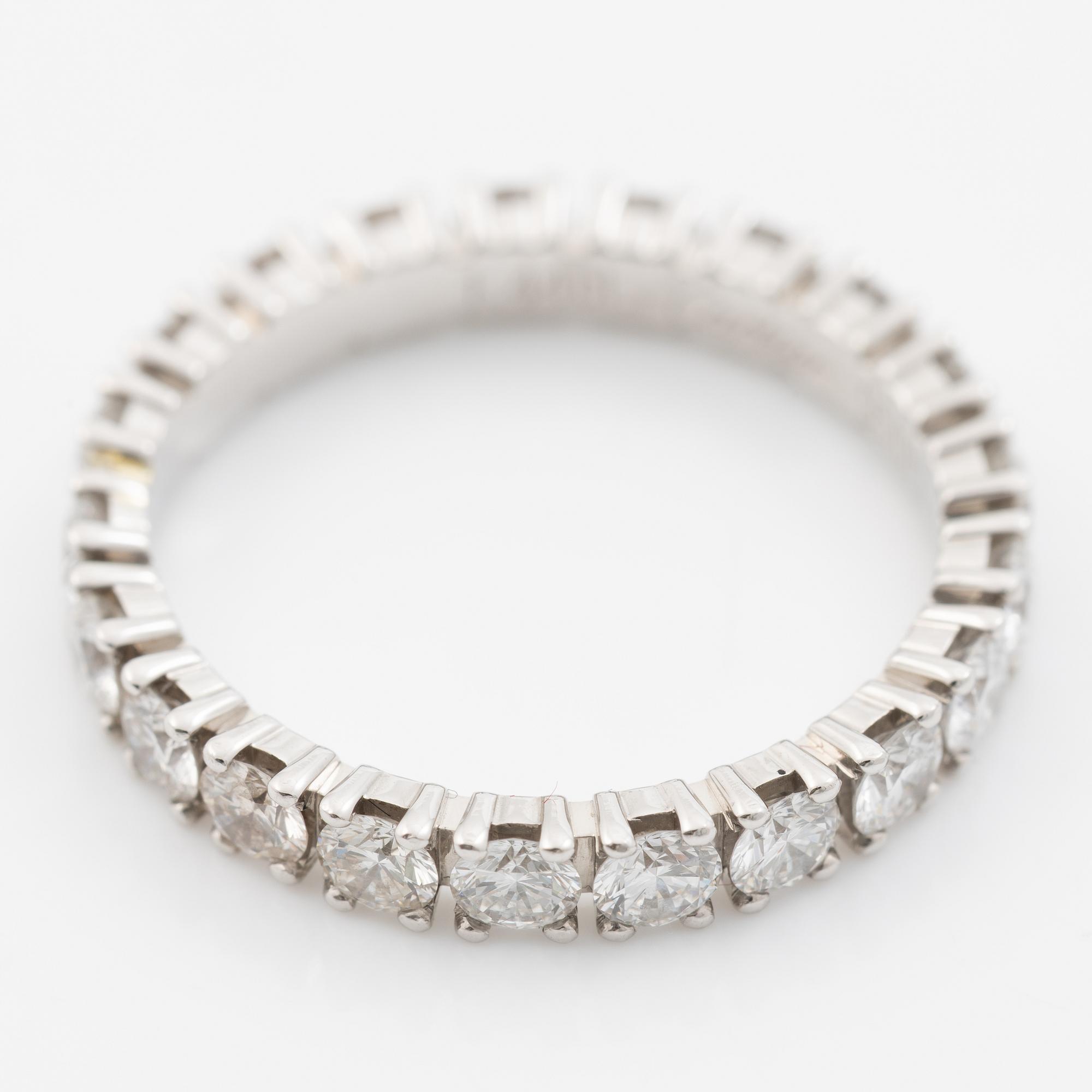 Ring, Cartier, helallians platina med briljantslipade diamanter.