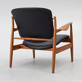 Finn Juhl, A 'FD 136' easy chair, France & Daverkosen, Denmark 1950s.
