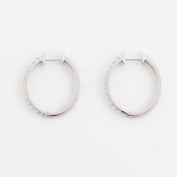 Brilliant cut diamond hopp earrings.