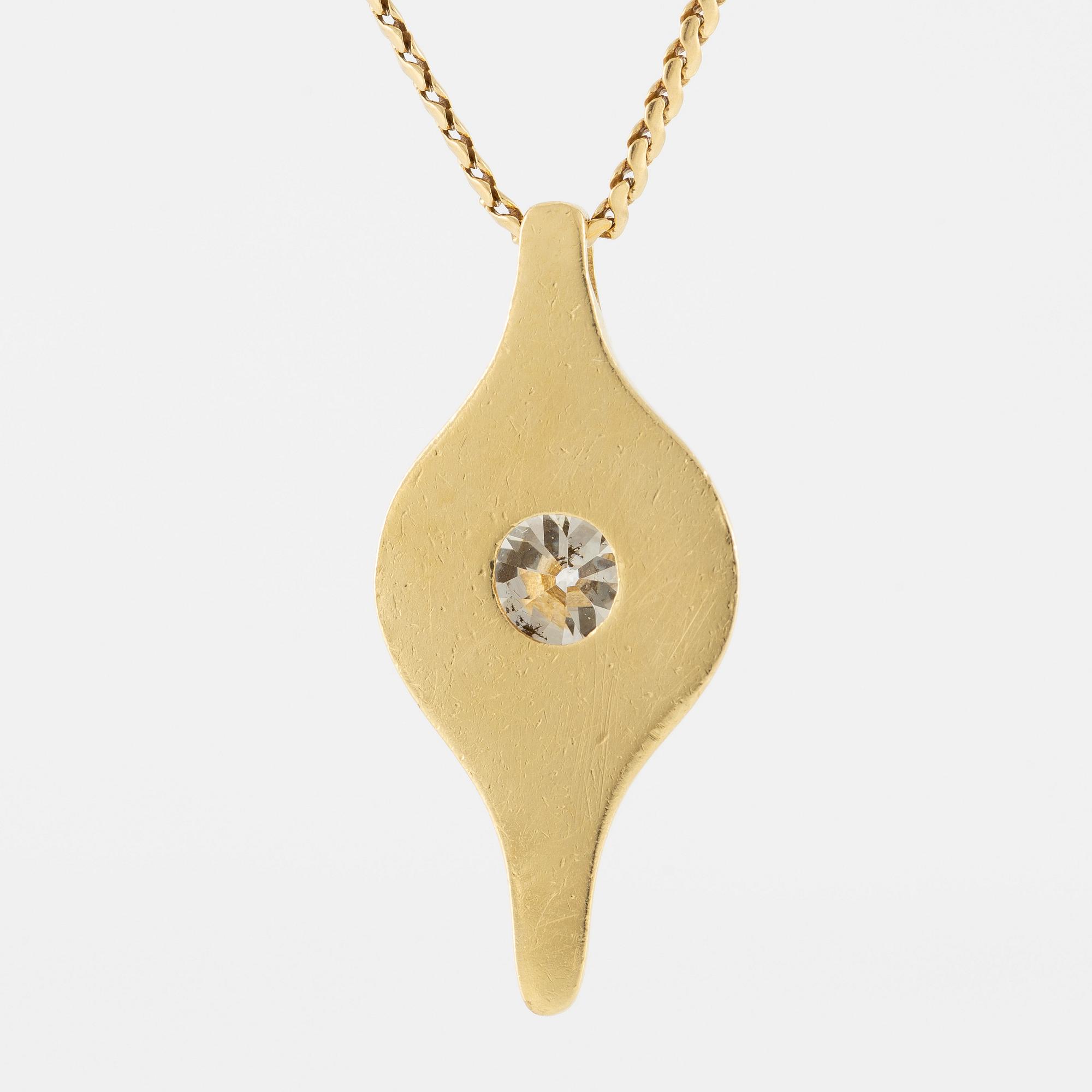 Pendant in 18K gold with a round brilliant-cut diamond.