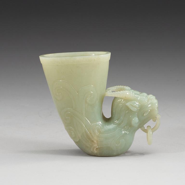 A Chinese carved nephrite rhyton beaker.