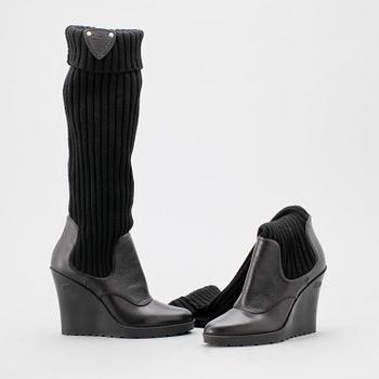 A pair of black boots from Gucci.