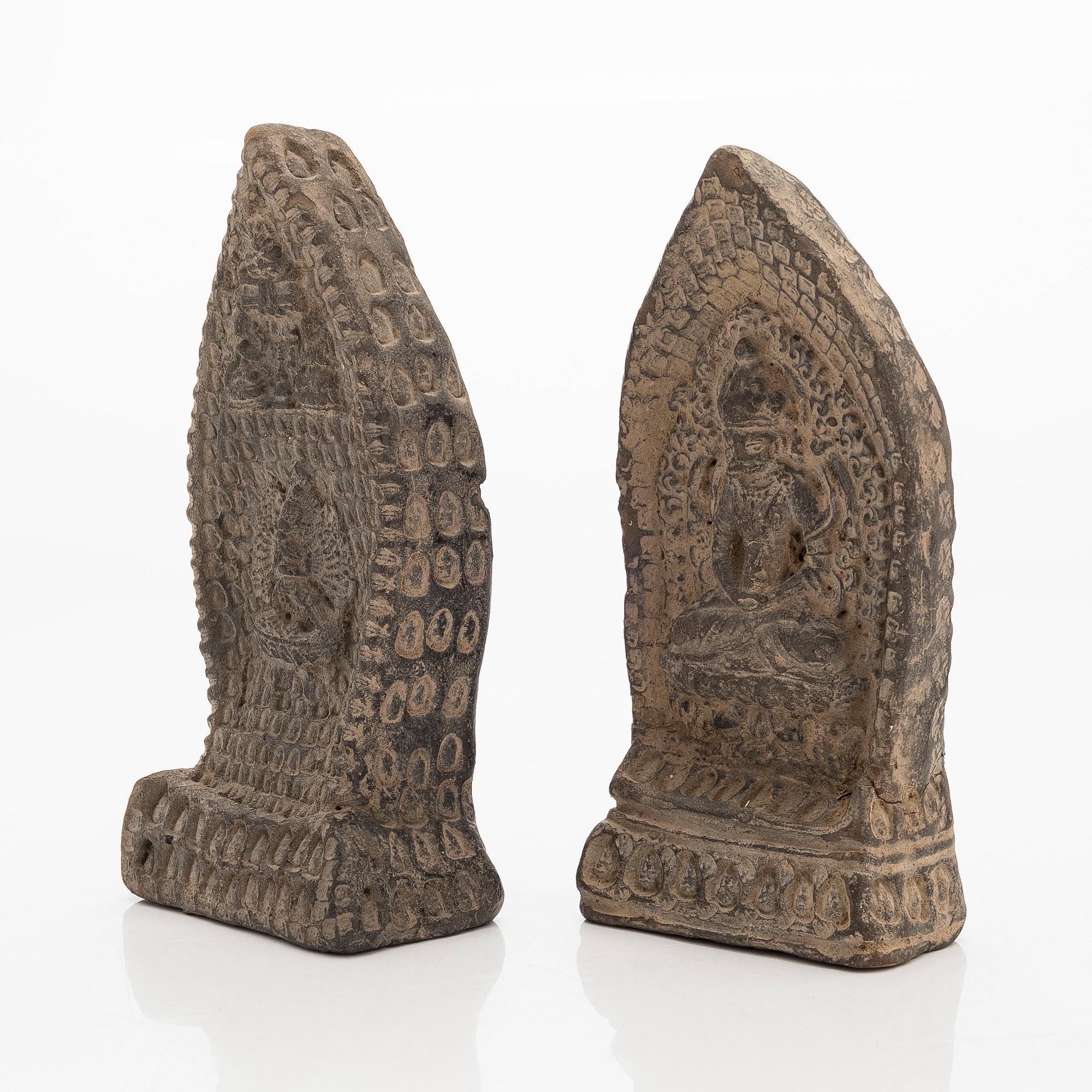 Two steles/tsa tsas, presumably circa 1900.