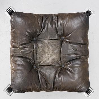 Sigurd Ressel, a pair of 'Falcon chair' easy chairs with an ottoman, Vatne Möbler, Norway, 1970s.