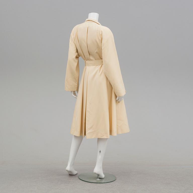A trench-coat by Guy Laroche.