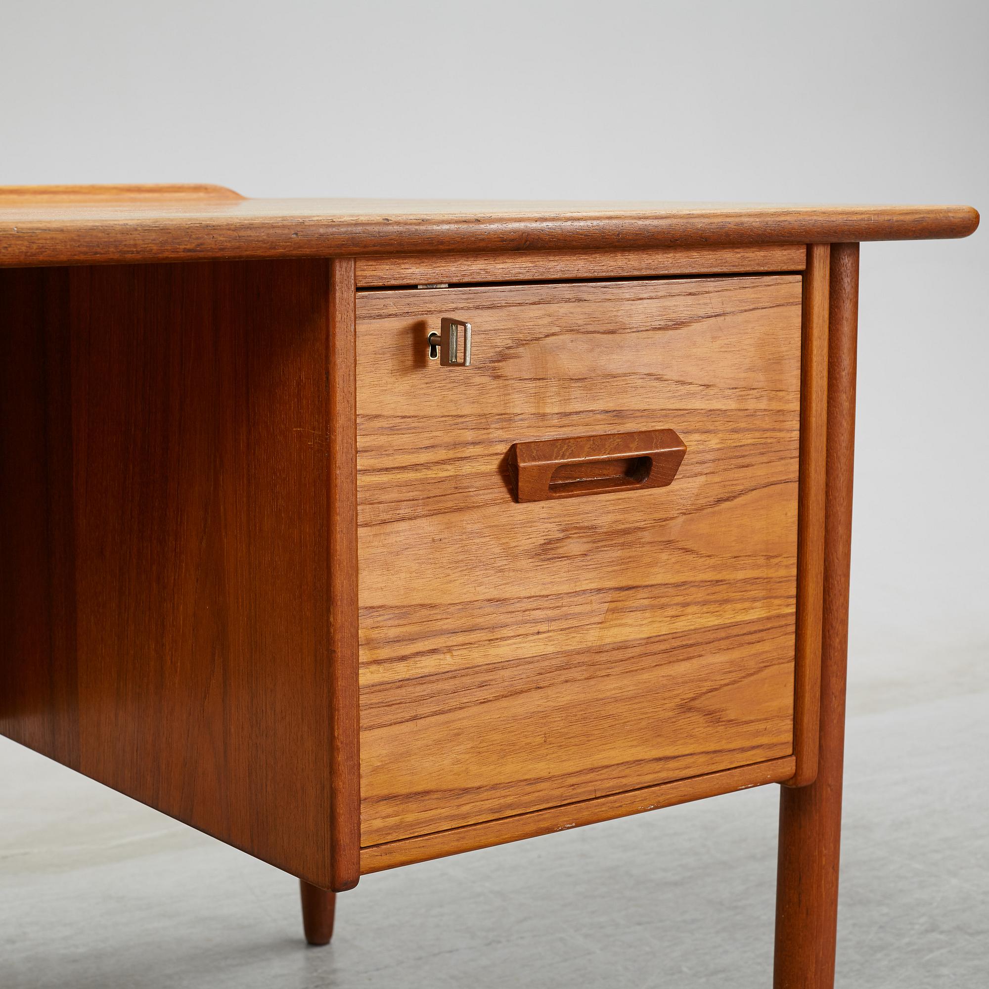 A 1950/60's teak writing desk.