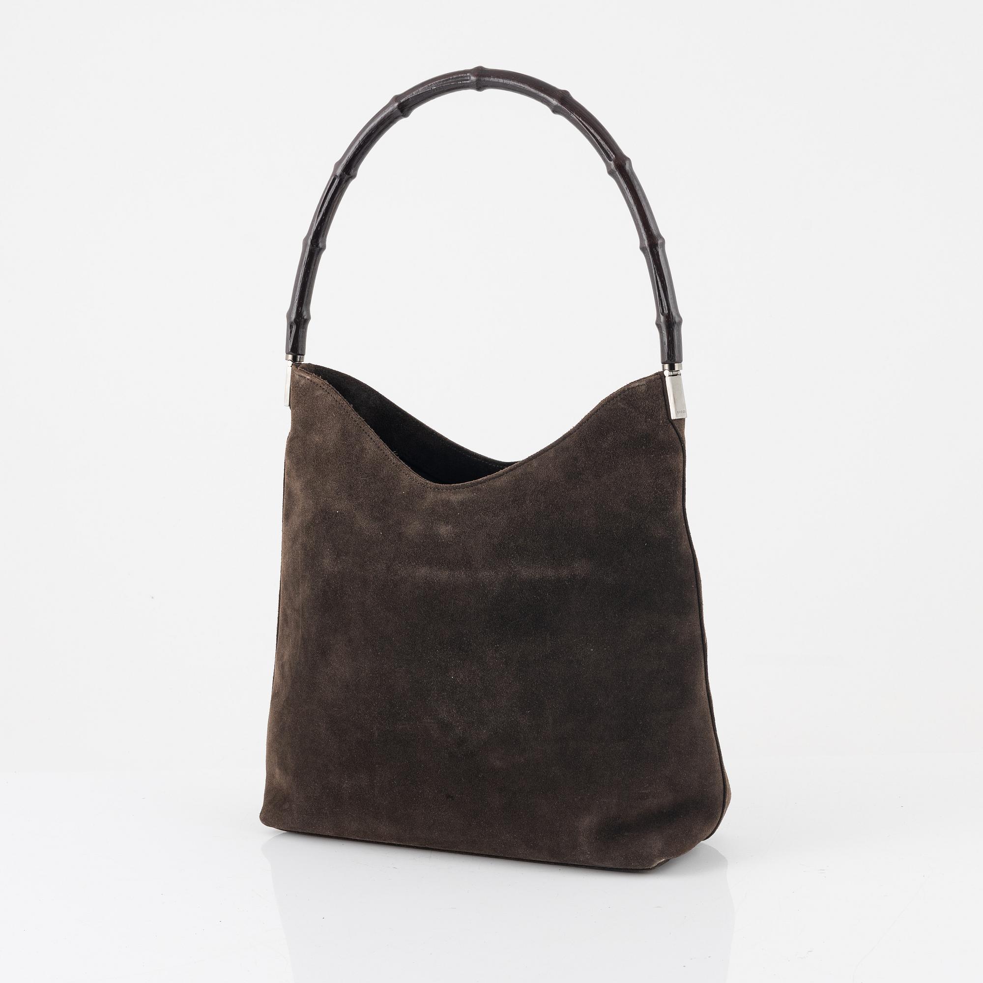 Gucci, a Bamboo suede bag.