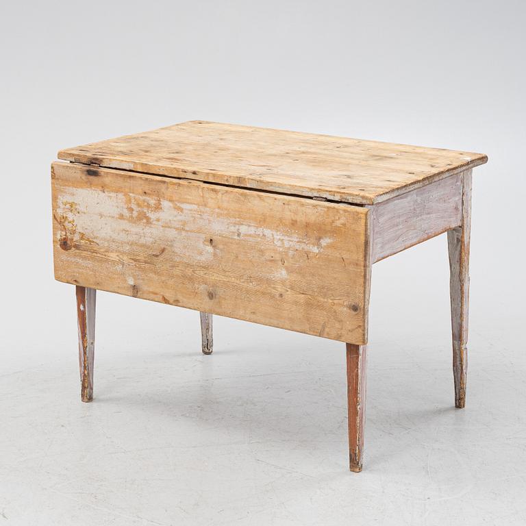 A pine table, 19th Century.