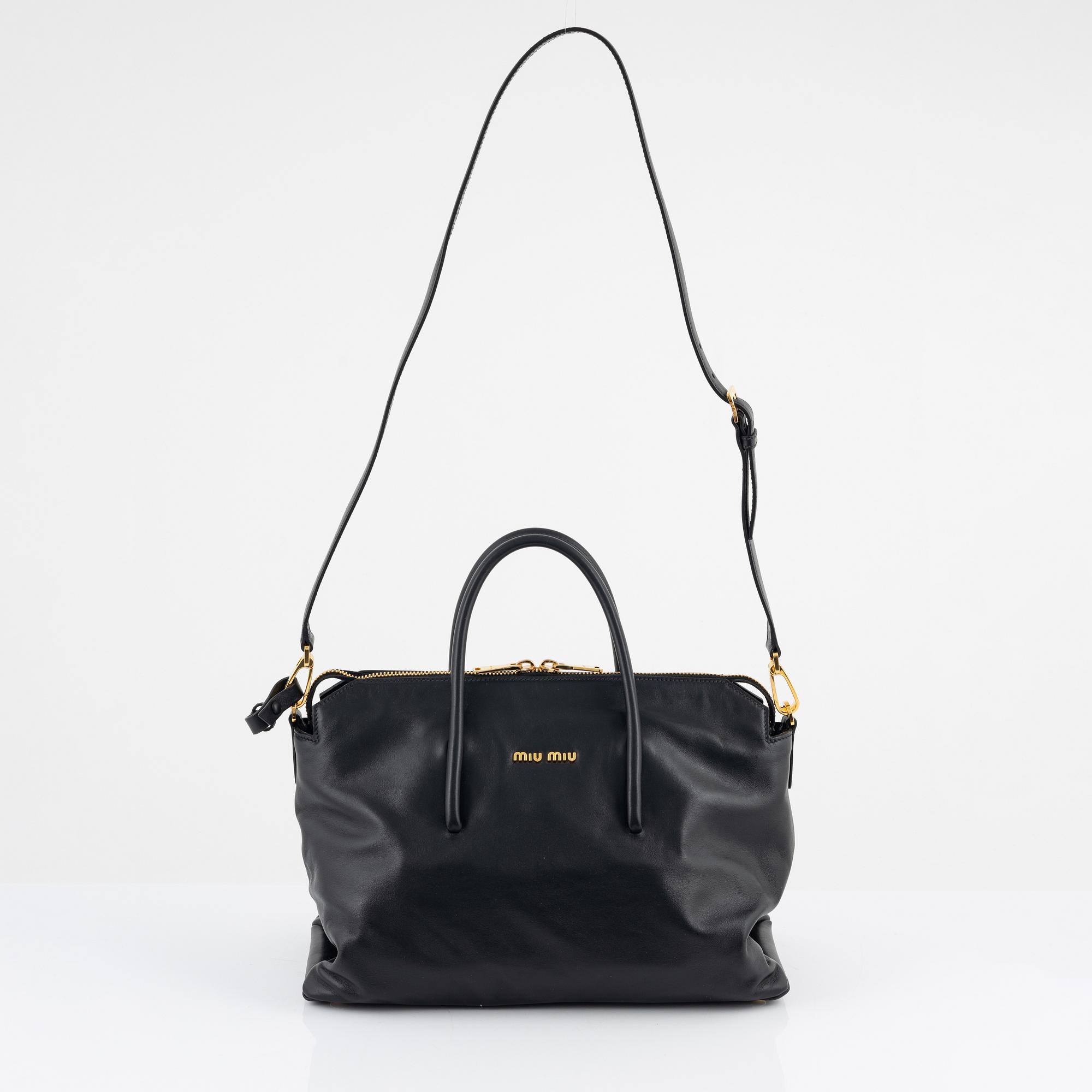 Miu Miu, a black leather handbag.