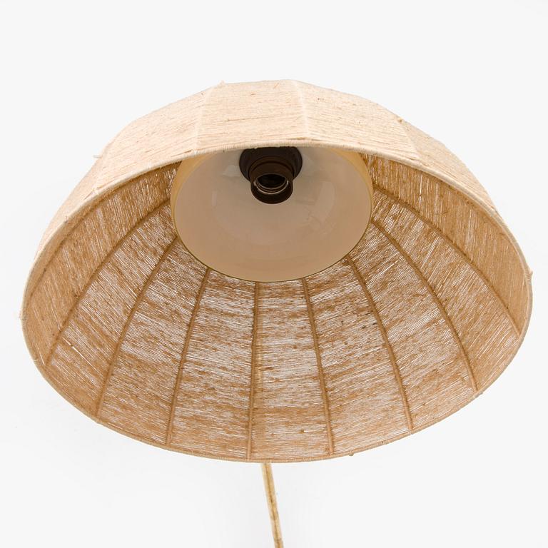 A mid-20th century wall light for Valinte, Finland.