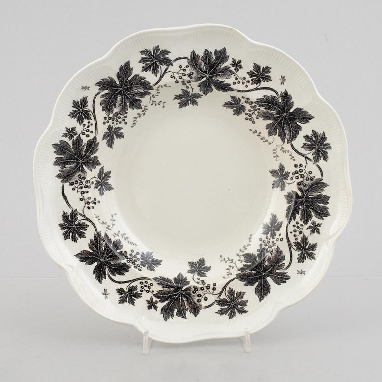 Arthur Percy, 57 pieces of a "Vinranka" creamware service, Gefle, Sweden, first half of the 20th century.