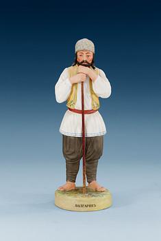 1341. A Russian bisquit figure of a Bulgarian yeoman, Gardner manufactory, ca 1900.