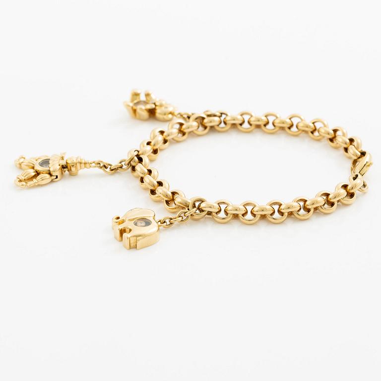 Chopard armband med berlocker 18K guld med runda briljantslipade diamanter.