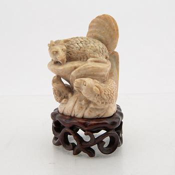 A Chinese stone sculpture 20th century.