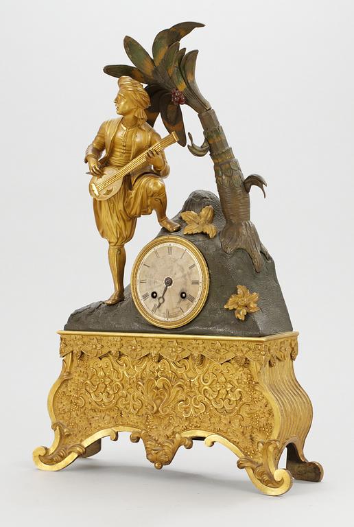 A French 1830/40's century gilt and patinated bronze mantel clock.