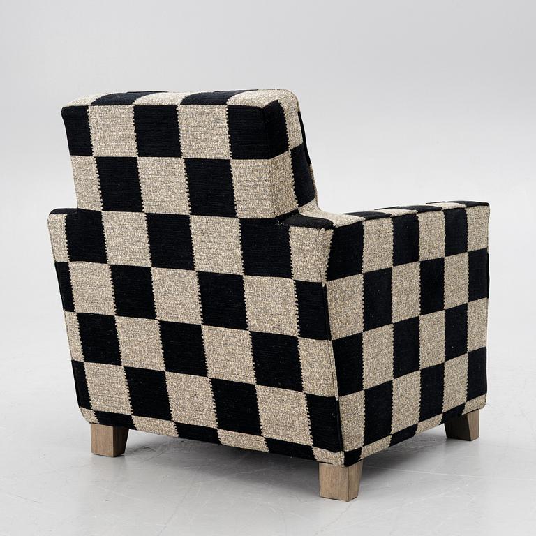 A 'Caspian Club Chair' by RIJD, contemporary.