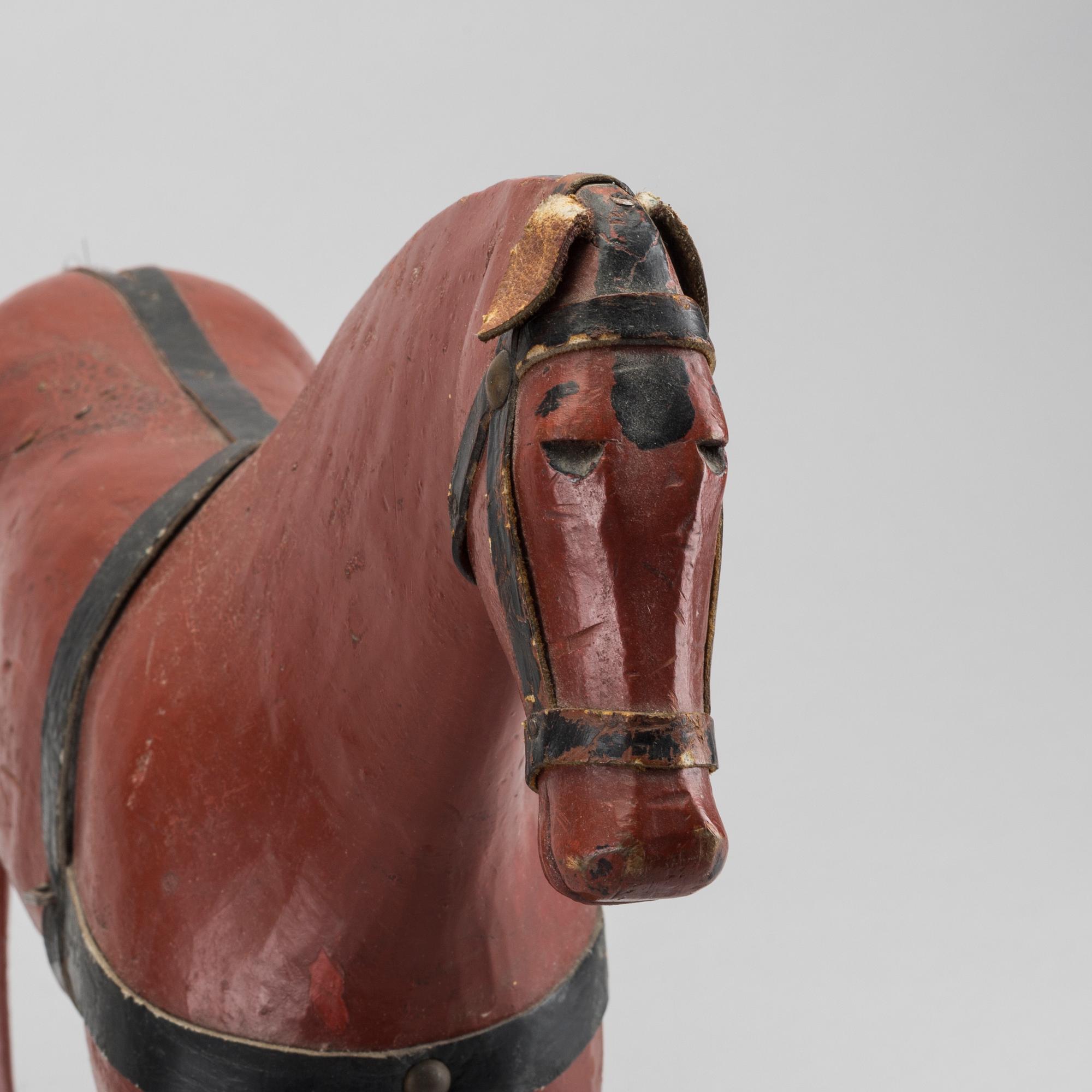 A toy wooden horse, late 19th cenury / turn of the century 1900.