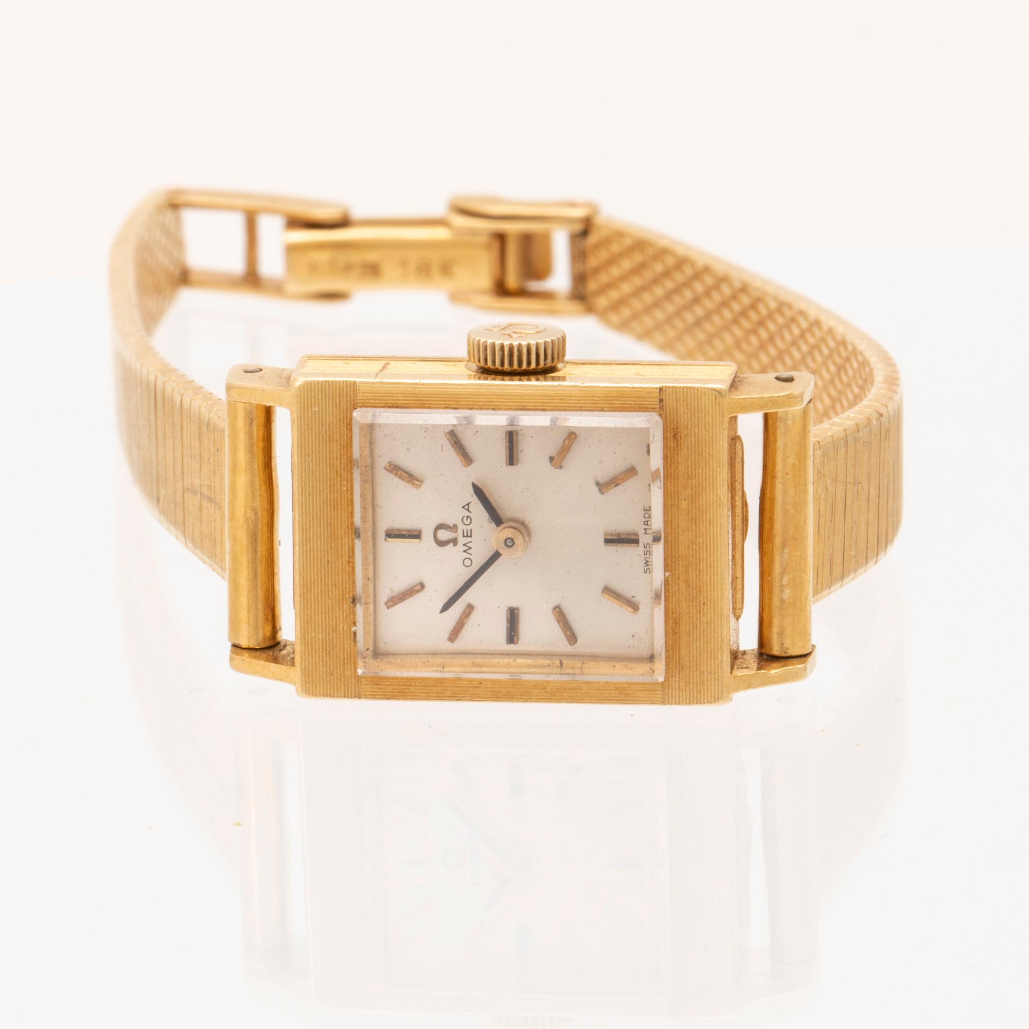 Omega, damarmbandsur, guld.