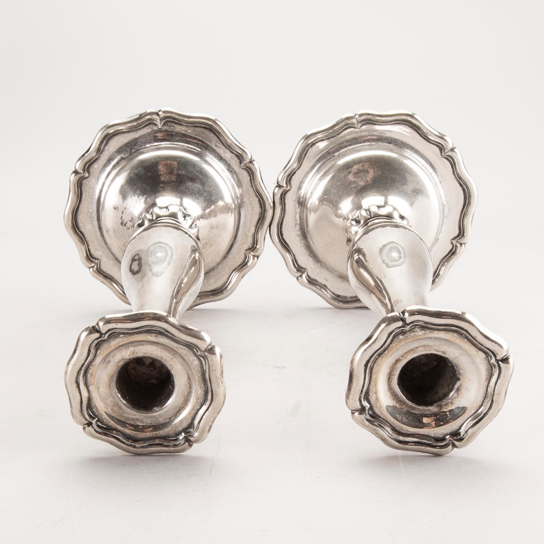 A pair of Austrian silver candle sticks Vienna 1852 weight 626 gr.