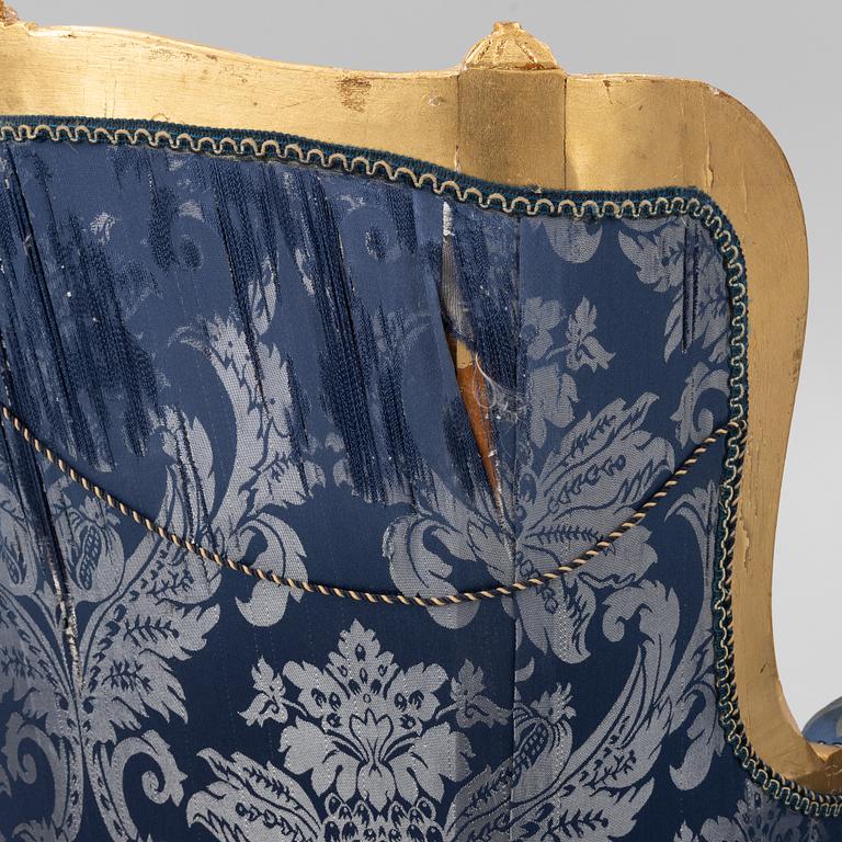 A pair of Louis XVI style armchairs, late 20th Century.