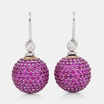 582. A pair of pink sapphire, diamond and cultured pearl earrings that can be worn in two different ways.