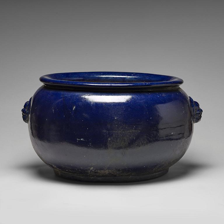 A large blue glazed flower pot/censer, presumably late Qing dynasty.