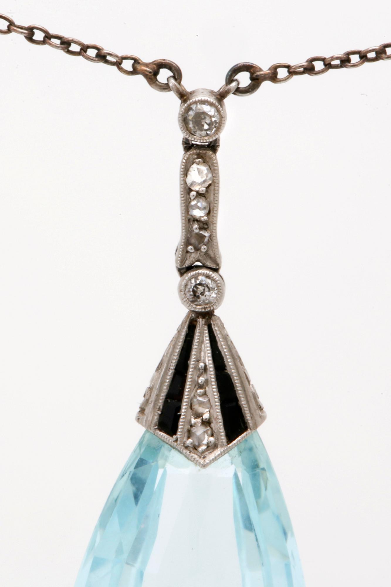 Aquamarine pendant on chain, low ct gold, 1 aquamarine height approx 2,5 cm, rose-cut diamonds and probably onyx.