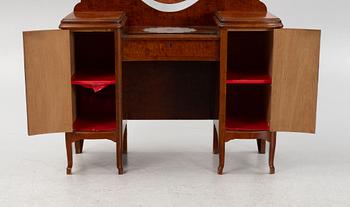 A birch veneered dressing table with two chairs.