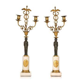 118. A pair of late Gustavian white marble and bronze candelabra.