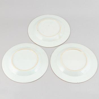 Three famille rose 'double peacock' plates, Qing dynasty, Qianlong (1736-95).