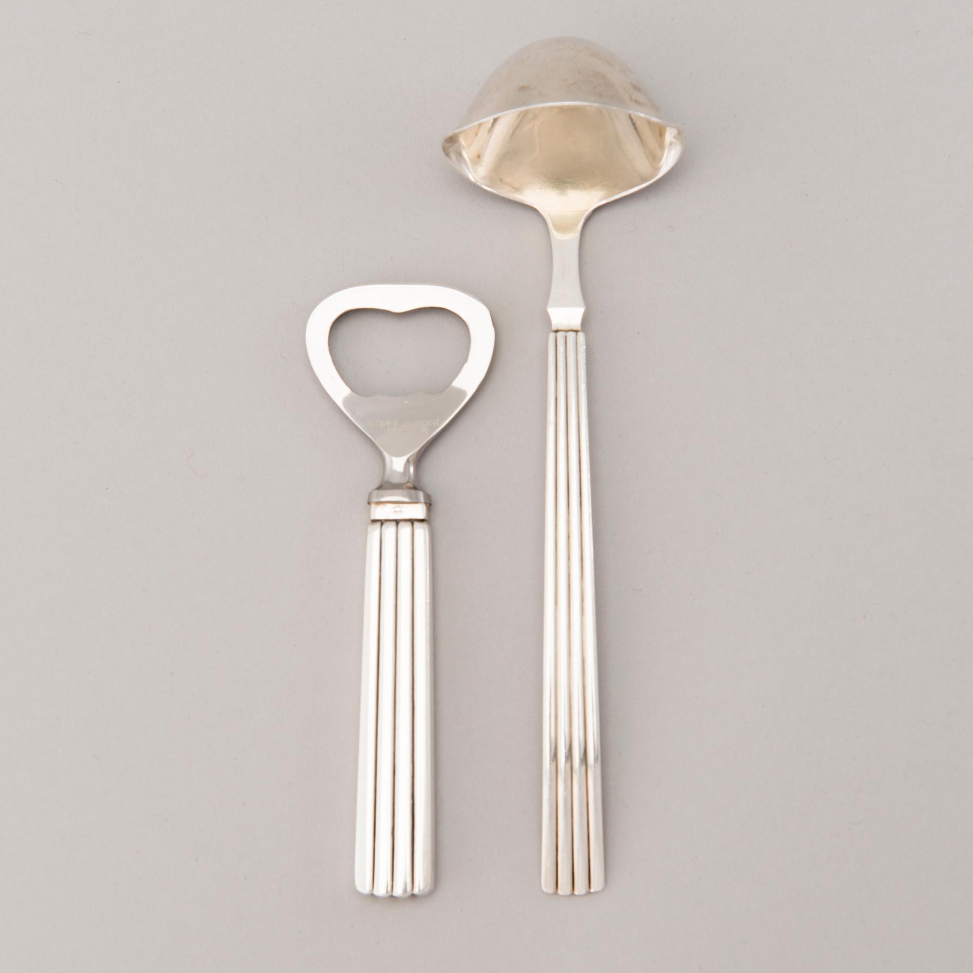 A 106 PIECE SILVER 'Bernadotte' cutlery set for George Jensen Denmark 1945-1977.