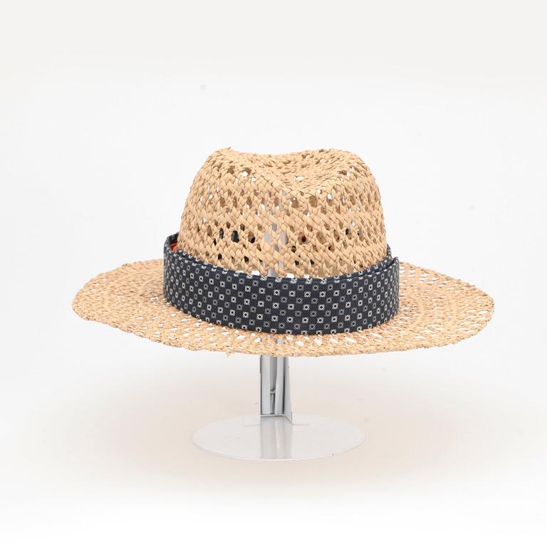 PRADA, a straw hat.