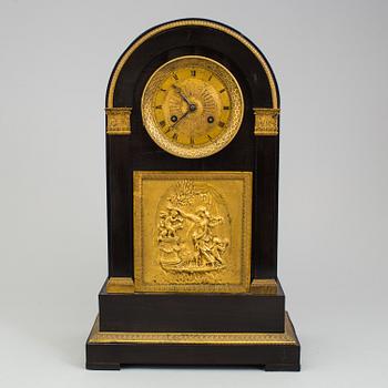 An enpire mantle clock, first half oc the 19th Century.