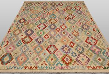 A Kilim rug, approx. 297 x 248 cm.