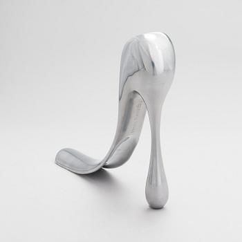 A metal shoe horn by Manolo Blahnik, 2000s.