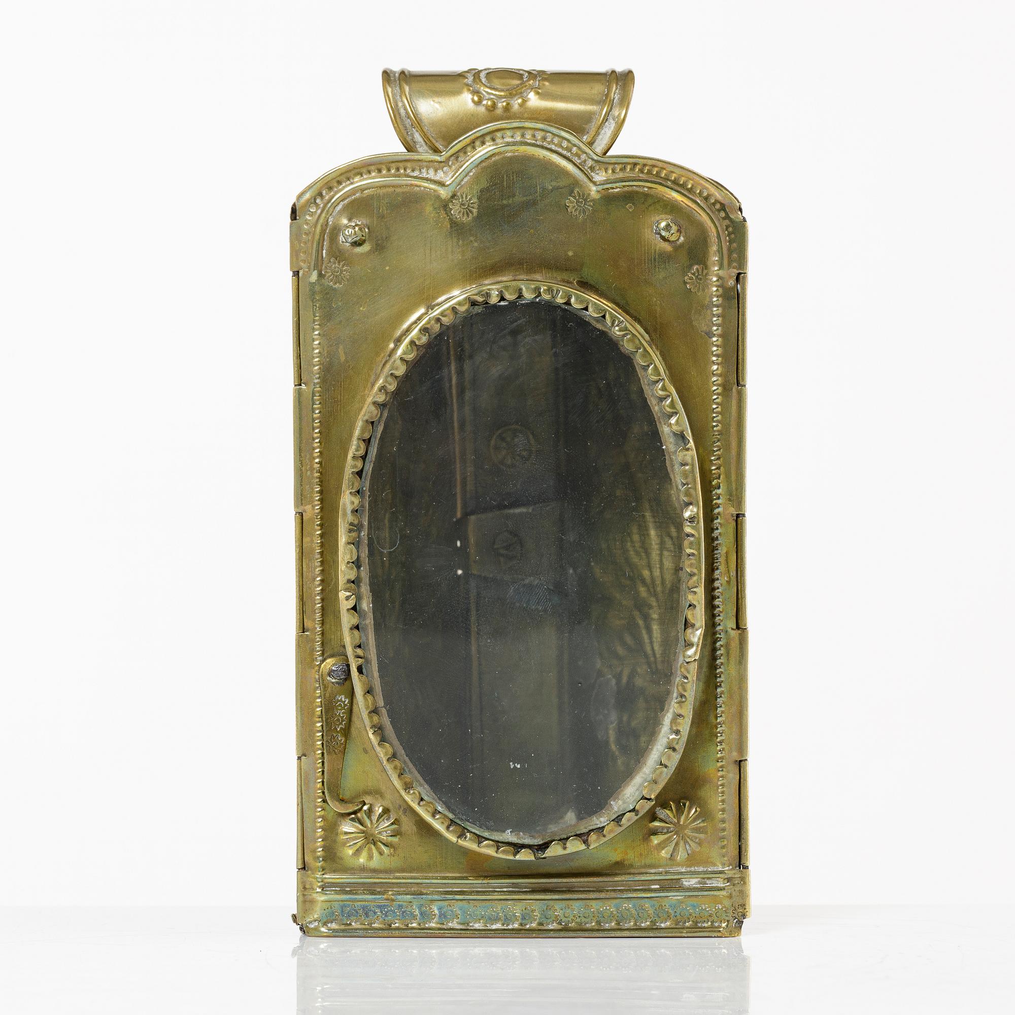 A Swedish repousse brass collapsible travel-lantern, circa 1800.