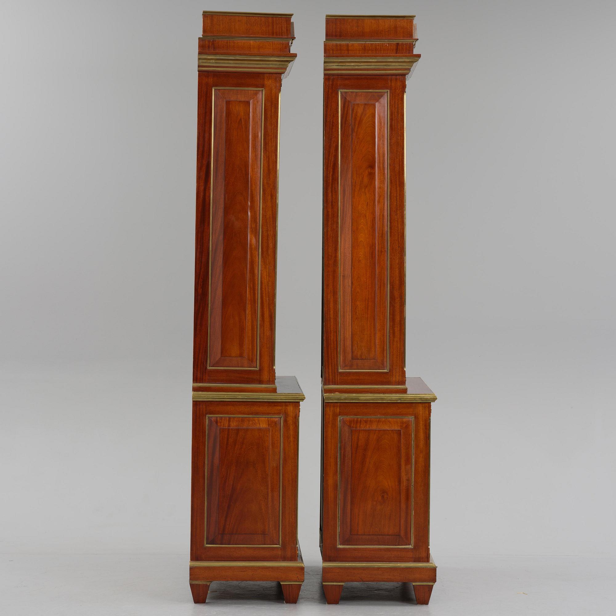 A pair of Russian mahogany and brass-mounted Jacob-style bibliothèques, modern with old parts.