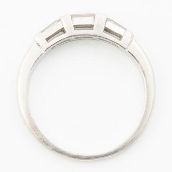 Platinum ring with baguette-cut diamonds.