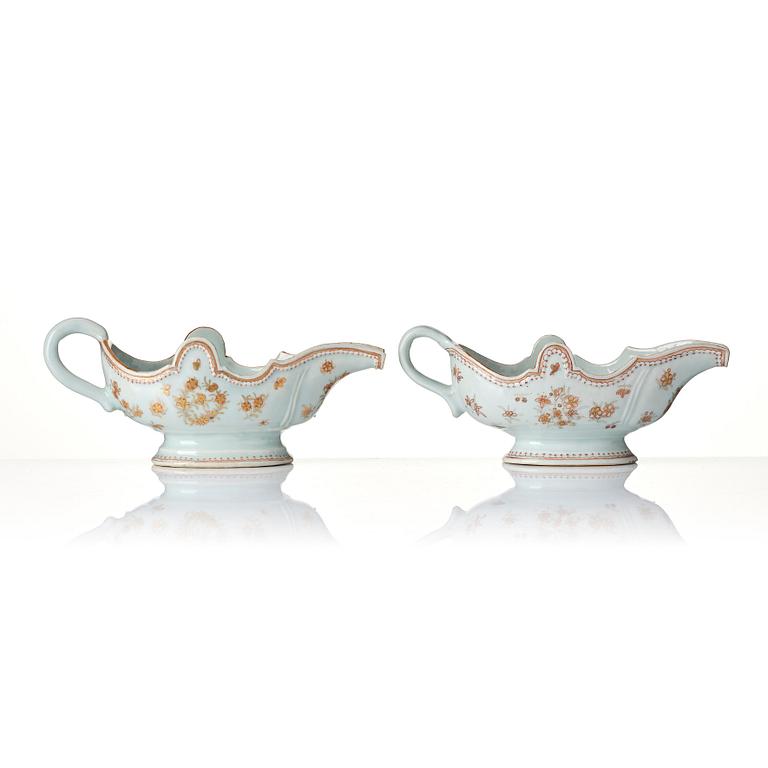 A set of two iron red and gold sauce boats, Qing dynasty, Qianlong (1736-95).
