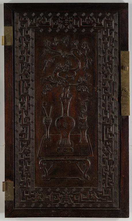 A Chinese wooden panel, Qing dynasty.