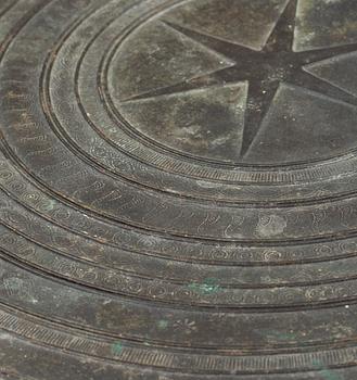 A Shan frog drum with a central star and four frogs on the tympanon, Myanmar, Laos or North Thailand, 19th Century.