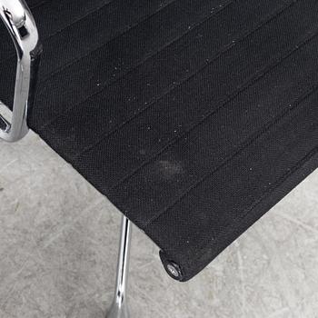 Charles & Ray Eames, A pair of EA 108 armchairs, Vitra.