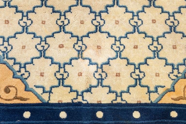 A carpet, China, antique finish, ca 275 x 185 cm.