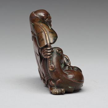 A bronze sculpture of one of the immortals, Qing dynasty, 18/19th Century.