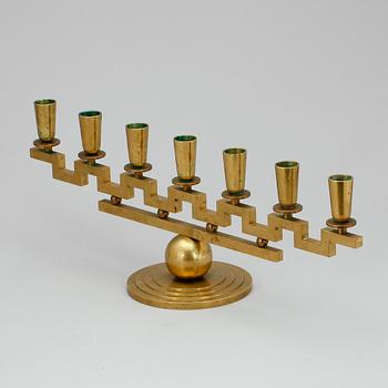 LJUSSTAKE, mässing, Lars Holmström, Arvika.