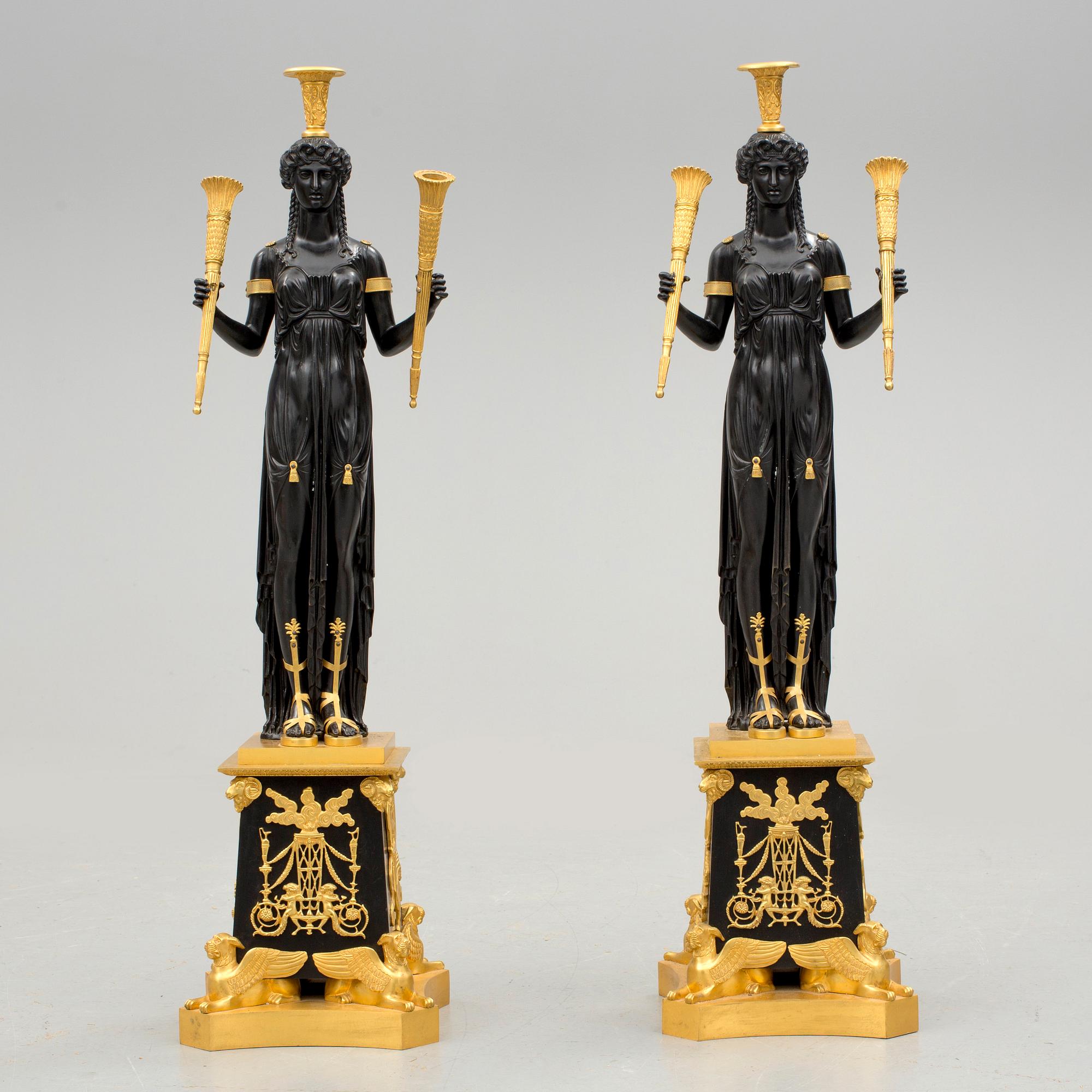 KANDELABRAR, ett par, för tre ljus, empirestil, 1900-tal.