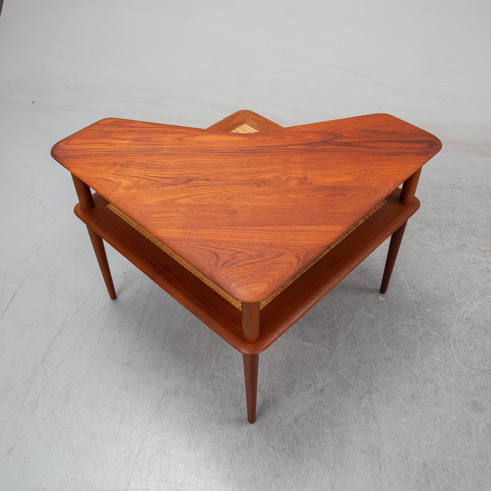 Peter Hvidt & Orla Molgaard Nielsen, a 'Minerva' teak table, France & Son.