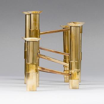 KANDELABER, "Serieljusstake Nonstop", mässing, design Tapio Wirkkala, Hopeakeskus 1970-tal.