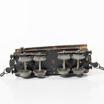 Model train with track and station building, 13 pieces, Germany, 1920s.